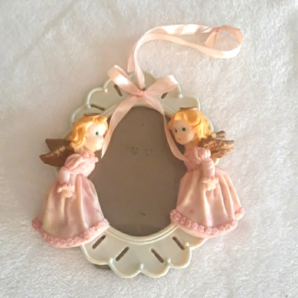 Angel photo frame with pink ribbon